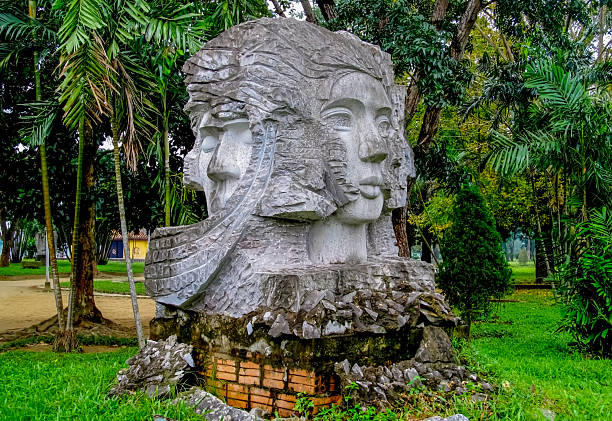 Ho Chi Minh, Vietnam 12 December 2015: Traditional Vietnamese statues displayed in temple setting, carved figures with historic details, cultural heritage art, Asian religion sculpture, stone and wood materials, travel destination in Vietnam
