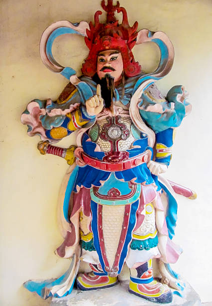 Ho Chi Minh, Vietnam 12 December 2015: Traditional Vietnamese statues displayed in temple setting, carved figures with historic details, cultural heritage art, Asian religion sculpture, stone and wood materials, travel destination in Vietnam