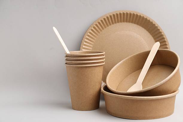 istock Set of disposable tableware on light grey background, closeup. Space for text 2252698023
