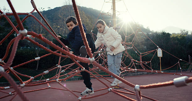 Children having fun and playing in the playground