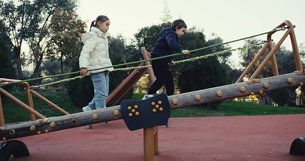 Children having fun and playing in the playground