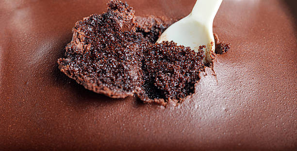 istock Close-up image of a spoon scooping chocolate. macro of chocolate 2252699015