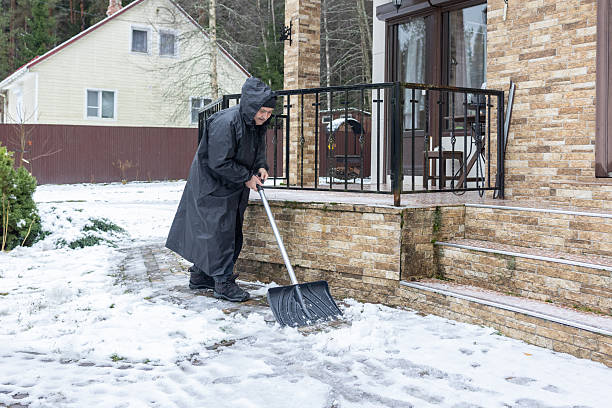 istock Elderly man shoveling snow in winter yard 2252699111