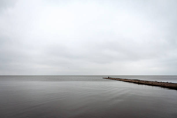 Old concrete pier under a cloudy sky in Nida, Curonian Spit and Curonian Lagoon, Lithuania