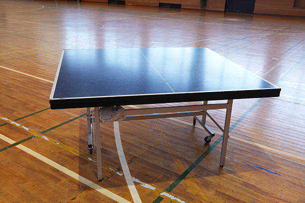 istock A black table with a white border sits in a gymnasium 2252706796