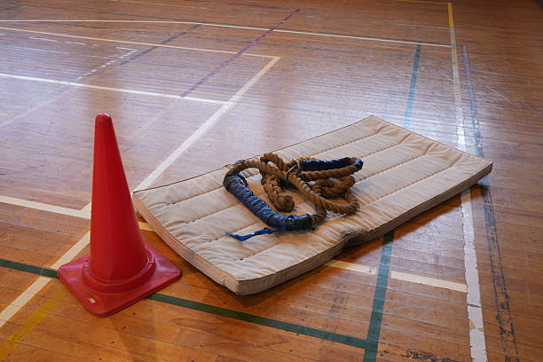 istock A red cone and a rope are on a gym floor 2252707620