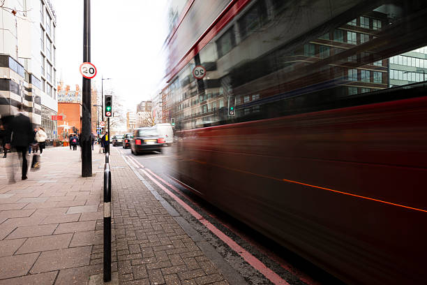istock Red bus with motion blur on the Euston Road in London 2252707740