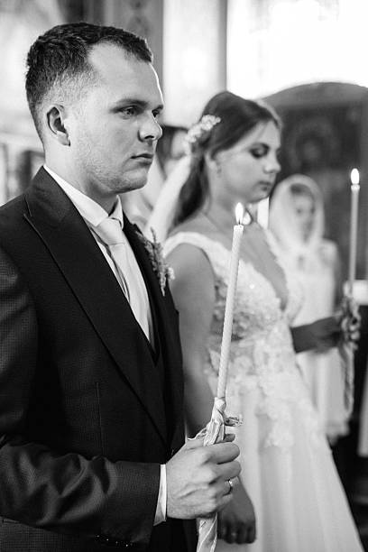 portrait of a beautiful girl making communion in Spain looking at the camera
