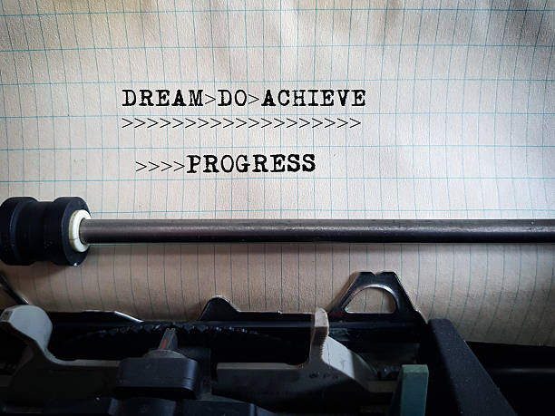 istock Dream do achieve progress typewriter, motivation inspirational quote 2252711412