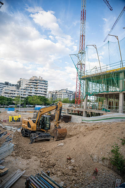 istock Image of an excavator within a residential buildings construction zone 2252712239