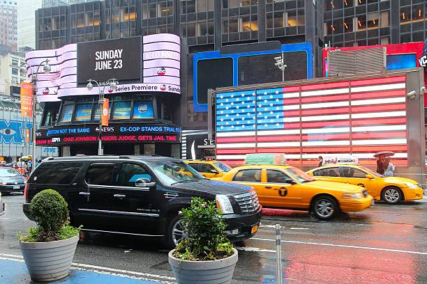 An energetic street view of Times Square in New York City, captured in 2012. This nostalgic photo highlights the iconic illuminated billboards, advertisements, and bustling crowds that define this world-famous destination. The vibrant scene reflects the dynamic spirit of Times Square during that era.