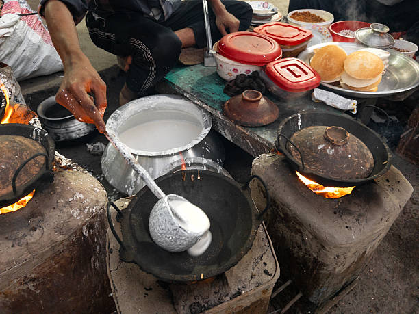 istock Handmade Chitoi Pitha Rice Cakes Being Cooked Over Open Fire 2252714398