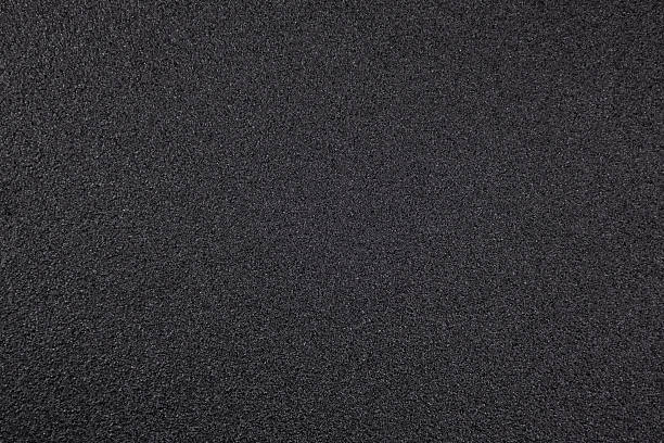 istock Surface of dark material with fine texture used for various applications in construction or art in a studio or workshop setting 2252714930