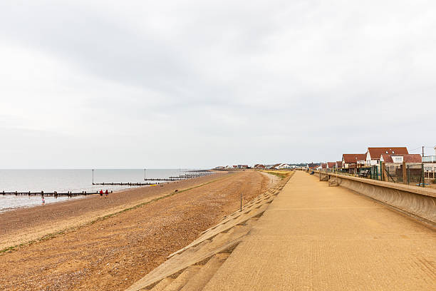 istock Heacham Beach, Heacham, Norfolk. Coastal beachfront pathway along a quiet seaside town with houses 2252719133