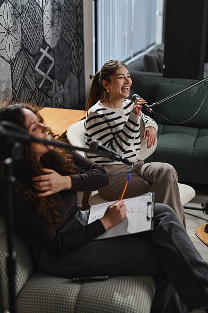 istock Two Podcasters Sharing Uplifting Stories and Positive Mindset Tips 2252719407