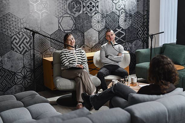 istock Two Hosts Interviewing Female Influencer in a Podcast Studio 2252719752