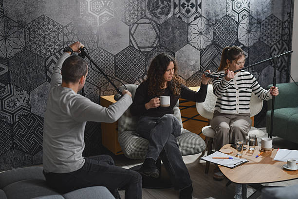 istock Behind-the-Scenes Moment: Hosts Getting Ready for Podcast Recording 2252719788