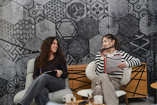 istock Casual Podcast Talk With Two Friends Interviewing Each Other In Cozy Studio Setting 2252720695
