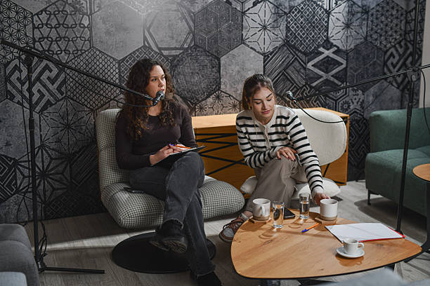 istock Two Podcast Hosts Planning Interview Questions During a Recording Session 2252720929