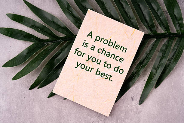 istock Notepad with quotes a problem is a chance for you to do the best 2252721074