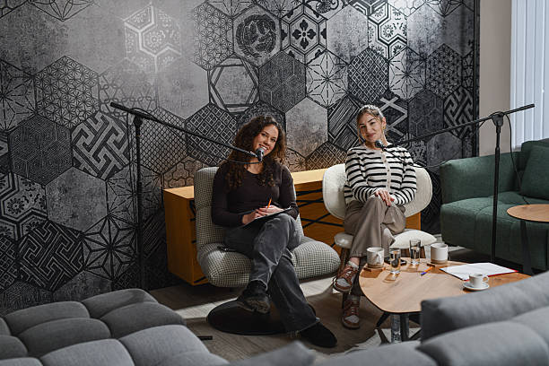 istock Two Female Podcast Hosts Posing For a Photo in Studio 2252721280