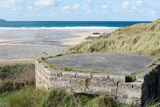 istock Concrete structure on a beach overlooking the sea. 2252721527