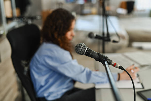 istock Relaxed Podcast Studio Interview With Microphone, Warm Vibes And Conversational Energy 2252723739