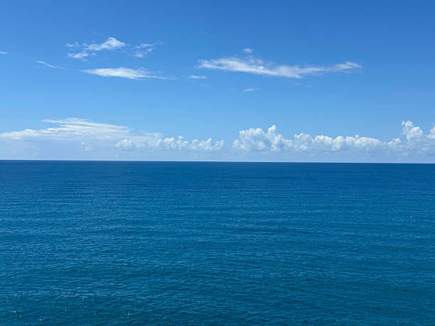 istock Blue calm sea and sunny blue sky horizon. 2252726851