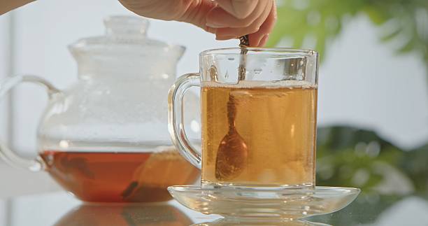 istock Glass Mug of Herbal Tea with Teapot 2252726892