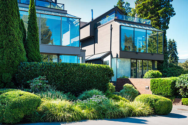 Two modern detached houses in Vancouver BC Canada, on a sunny day.