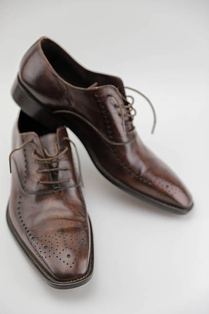 istock Stylish Men’s Footwear In Studio Lighting 2252728520