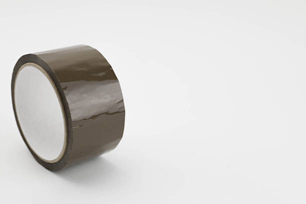istock Roll Of Brown Adhesive Tape Isolated 2252728670