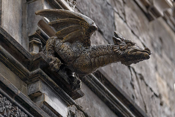 Russia, Samara Oblast, Khryashchevka village - July 31, 2023. Close-up of a stone winged gargoyle on the wall of Garibaldi Castle. Architectural details.