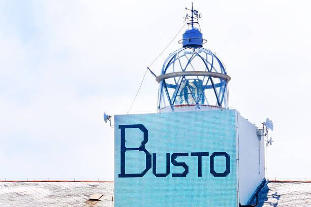 Busto lighthouse close-up view, Luarca, Asturias, Spain. Sky in the background.