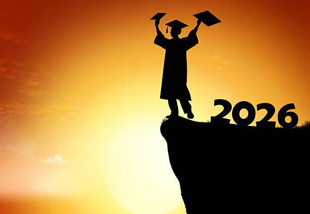 istock 2026 Graduation Celebration Concept with Happy Graduate Silhouette at Sunset 2252736459