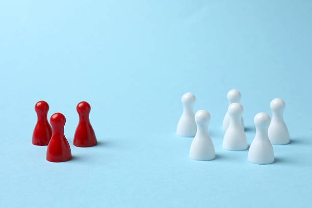 istock Group of pawns on the table. Concept of unity 2252738581