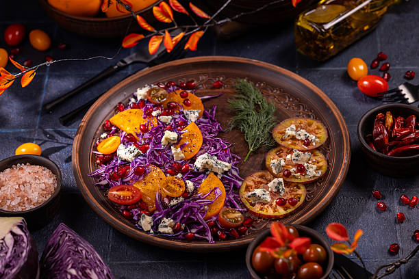 istock Delicious autumn salad featuring vibrant red cabbage and persimmon 2252738869