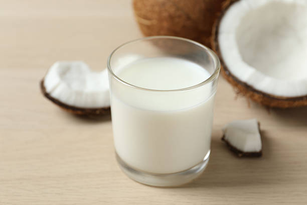 istock Glass of milk with coconuts on the table 2252739883