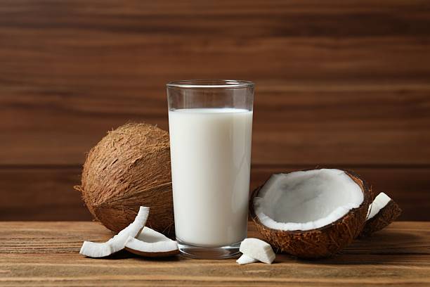 istock Glass of milk with coconuts on the table 2252739995
