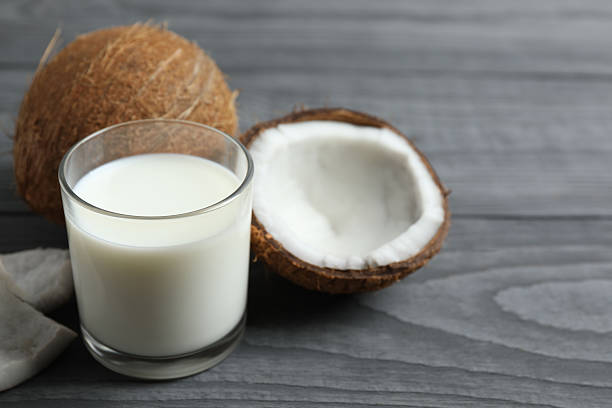 istock Glass of milk with coconuts on the table 2252740170