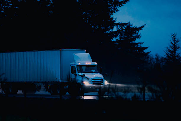 istock Semi-Truck on Freeway in the Rain 2252746698
