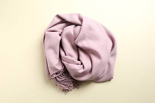 istock Warm scarf on a color background 2252750652