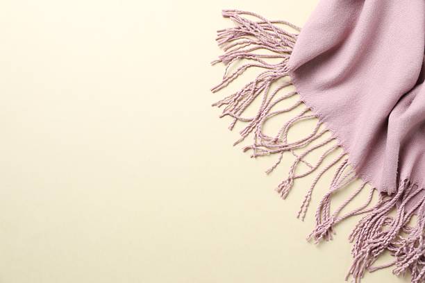 istock Warm scarf on a color background 2252750662