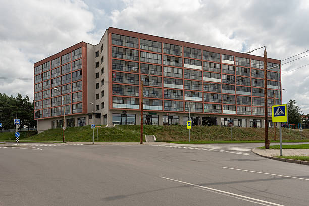 istock Modern Residential Building with Commercial Units on a Cloudy Day 2252755156