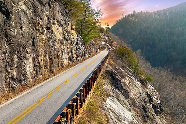 istock Fall foliage blazes along the Highlands Road mountain pass. Appalachian scenery with cliffs and colorful trees. 2252759824