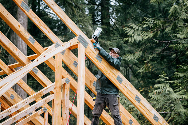 istock Construction Crew Putting Up Framing of New Home 2252767138