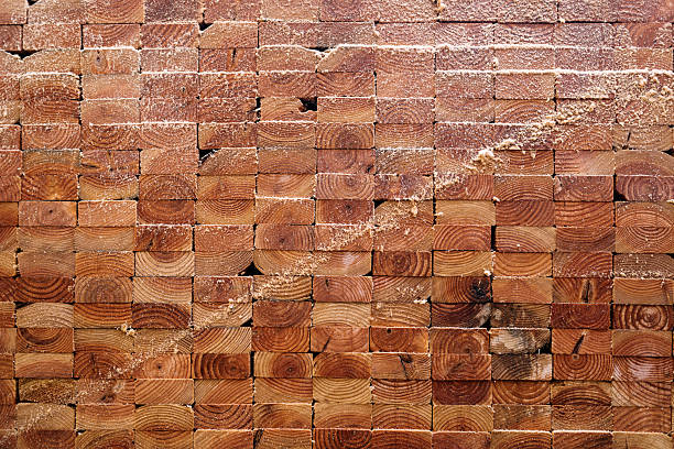Pile of many wooden timber stack background,  construction material backdrop