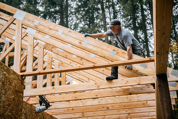 istock Construction Crew Putting Up Framing of New Home 2252767292