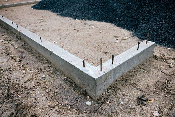 new modern car park gravel base with installed green plastic grid and white plastic lines