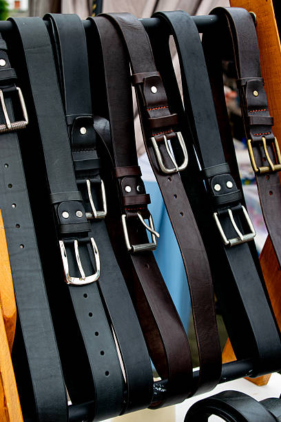 istock Close-up of genuine leather belts on display 2252772146
